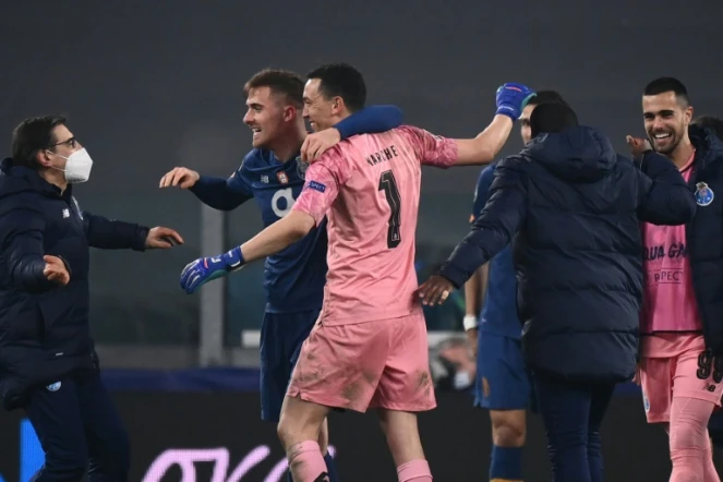 La joie des joueurs de Porto, qualifiés en quarts de finale de la Ligue des champions, après leur 8e de finale retour face à la Juventus, à Turin, le 9 mars 2021
