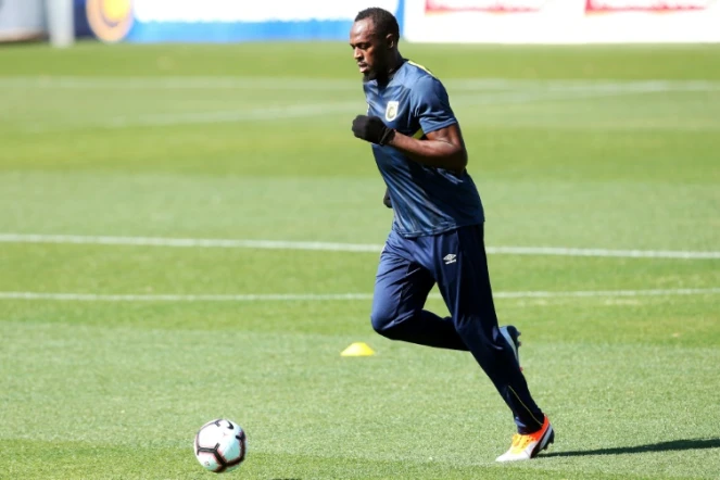 La superstar du sprint, Usain Bolt, à l'entraînement avec le club australien des Mariners, le 21 août 2018 à Gosford, au nord de Sydney