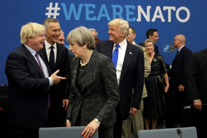 Le futur Premier ministre britannique Boris Johnson, la Première ministre sortante Theresa May et le président des Etats-Unis Donald Trump, ici lors d'une réunion de l'Otan à Bruxelles en mai 2017, alors que le premier était encore ministre des Affaires étrangères