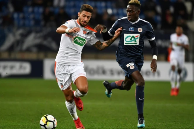Denis Bouanga (g), sous le maillot du FC Lorient, contre Montpellier en Coupe de France, le 24 janvier 2018 à La Mosson