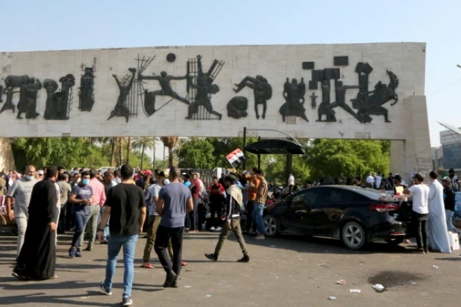 Des Irakiens se rassemblent sur la place Tahrir à Bagdad, le 26 octobre 2019