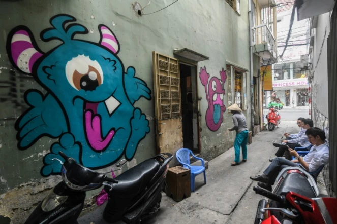 Ruelle avec graffitis à Ho Chi Minh-Ville, le 20 février 2017