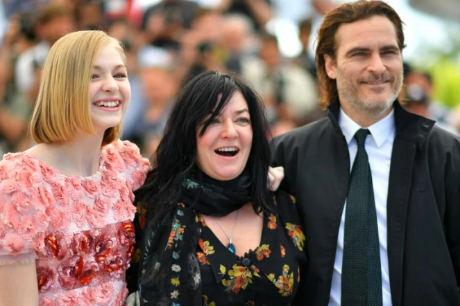L'actrice russo-americaine Ekaterina Samsonov, la réalisatrice britannique Lynne Ramsay et l'acteur américain Joaquin Phoenix posent pour la présentation du film "You were never really here", le 27 mai 2017 au Festival de Cannes 