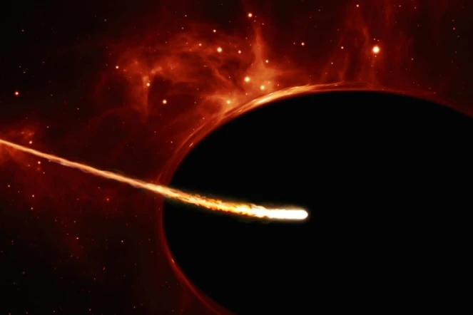 Représentation d'une étoile attirée par un trou noir, diffusée le 9 décembre 2016 par l'Agence spatiale européenne