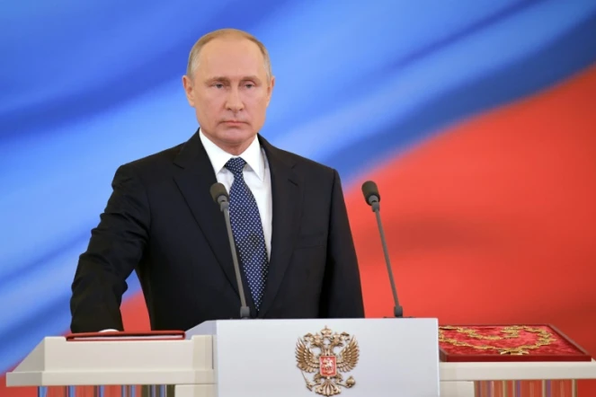 Vladimir Poutine prête serment lors d'une cérémonie au Grand palais du Kremlin à Moscou, le 7 mai 2018