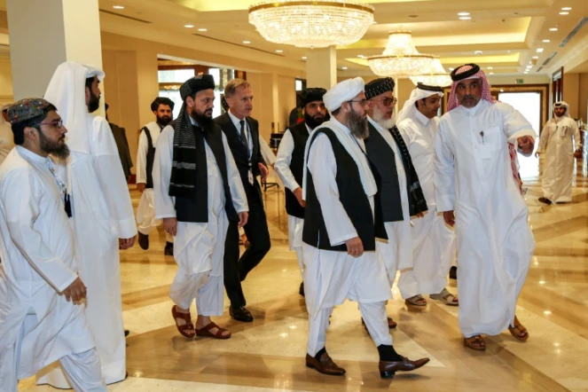 Des membres des talibans s'apprêtent à participer au dialogue avec des responsables afghans à Doha, le 7 juillet 2019