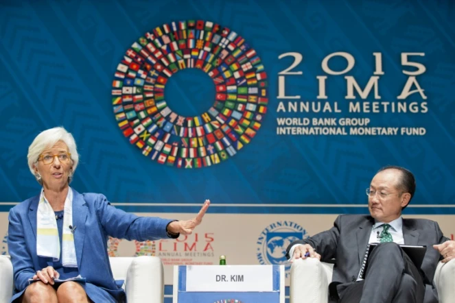 La directrice du FMI, Christine Lagarde et le président de la Banque Mondiale, Jim Yong Kim, le 7 octobre 2015 à Lima, au Pérou