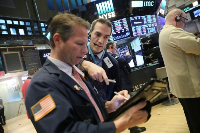 Traders sur le parquet du New York Stock Exchange le 6 février 2018