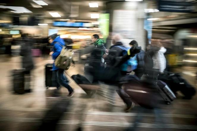 Des voyageurs le 8 février 2016 à la gare de Lyon-Part-Dieu à Lyon