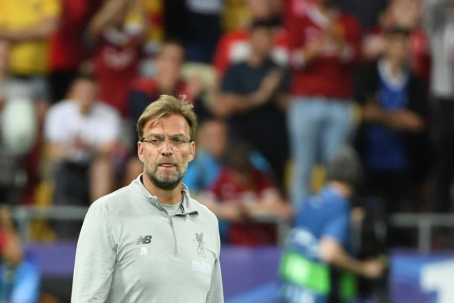 La déception de l'entraîneur de Liverpool Jürgen Klopp après la défaite face au Real Madrid en finale de la C1, le 26 mai 2018 à Kiev