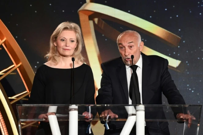 Le président de l'UNFP, Philippe Piat (à dr.) et la présidente de la LFP, Nathalie Boy de La Tour, à la remise des trophées de l'UNFP à Paris le 13 mai 2018