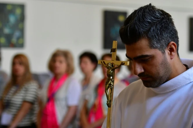 Des Chrétiens d'Orient célèbrent la messe dans la tradition chaldéenne, le 14 août 2018, à Lourdes