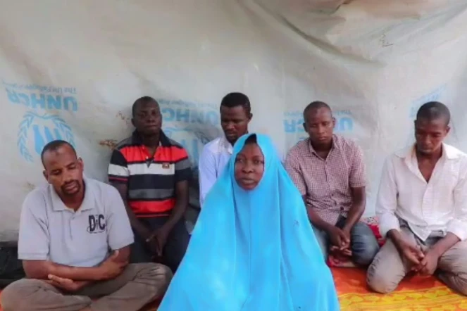 Capture d'écran d'une vidéo diffusée le 25 juillet 2019 par un groupe nigérian lié au groupe Etat Islamique montrant une femme affirmant être membre de l'ONG Action contre la Faim, et cinq de ses collègues