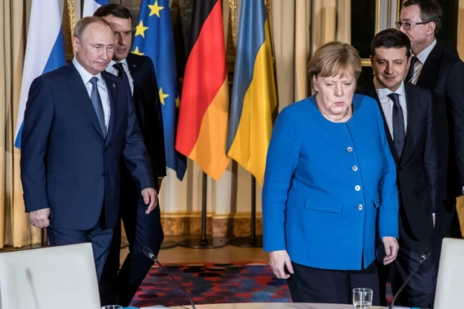 Le président russe Vladimir Poutine et la chancelière allemande Angela Merkel lors d'une réunion sur l'Ukraine à l'Elysée à Paris le 9 décembre 2019