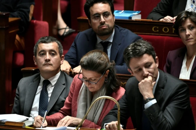 Agnès Buzyn (c) et Gérald Darmanin (g) à l'Assemblée nationale, le 16 octobre 2018