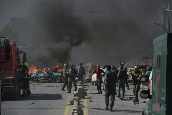 Les forces de sécurité afghanes arrivent sur les lieux d'un attentat, à Kaboul, le 31 mai 2017
