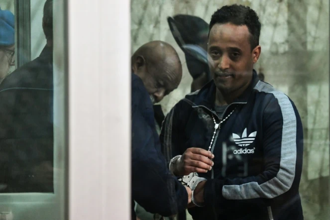 Un homme soupçonné d'être Medhanie Yehdego Mered, chef d'un réseau de trafic de migrants, mais affirmant s'appeler Medhanie Tesfamariam Behre, lors de son procès à Palerme le 14 février 2019 
