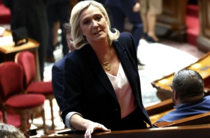 Marine Le Pen, présidente du groupe parlementaire du Rassemblement national (RN) à l'Assemblée nationale, le 1er avril 2025 à Paris ( AFP / Anne-Christine POUJOULAT )