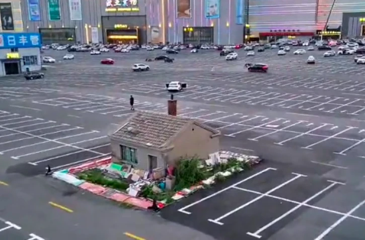 maison clou en chine
