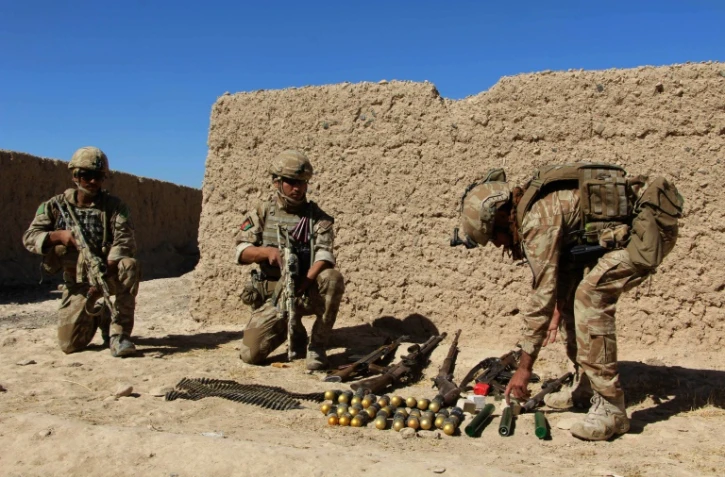 Des soldats de l'armée afghane après la bataille entre les Talibans et l'armée à Lashkar Gah, le 10 octobre 2016