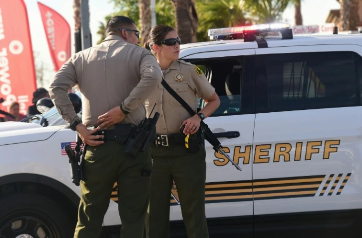 Policiers devant l'immeuble abritant des services sociaux à San Bernardino, (Californie)  cible le 2 décembre 2015 d'une fusillade meurtrière 