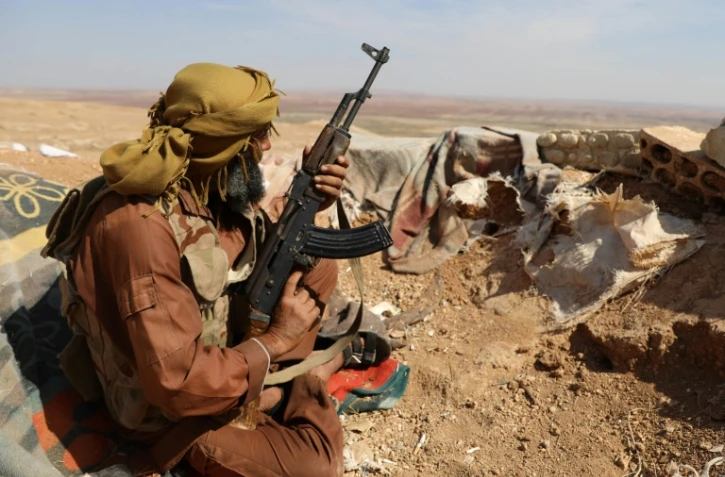 Un combattant rebelle syrien, dans la région d'Al-Eis, près de la province d'Idleb, le 7 octobre 2018. Les insurgés ont commencé à retirer leurs armes lourdes d'une future zone démilitarisée.