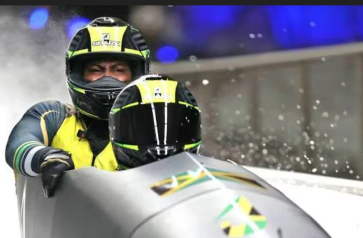 Le Jamaïcain Nimroy Turgott, ici avec Shanwayne Stephens lors des JO 2022 de Pékin, a décroché une médaille historique en bobsleigh. | YAO JIANFENG / XINHUA VIA AFP