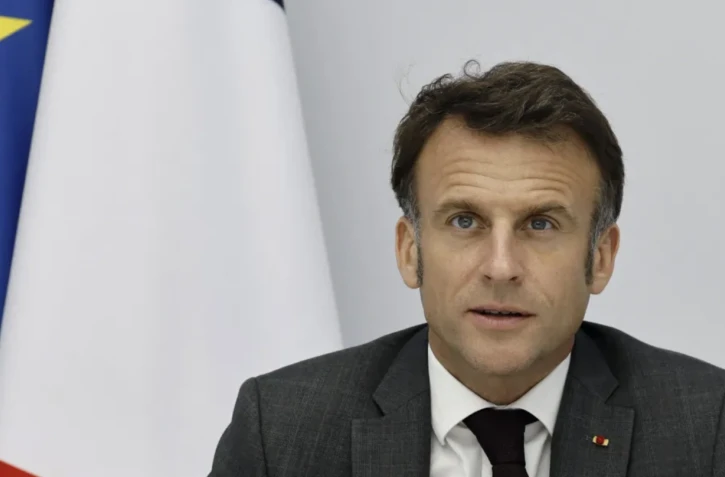  Avec la guerre en Ukraine, Emmanuel Macron s'assure une meilleure popularité AFP / © AFP or licensors