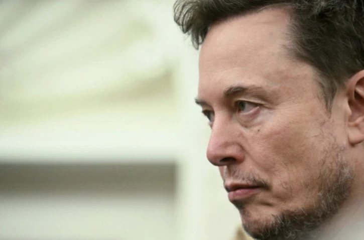 Elon Musk lors de la réception du président sud-africain Cyril Ramamphosa par Donald Trump dans le Bureau ovale de la Maison Blanche, à Washington, le 21 mai 2025 ( AFP / Jim WATSON )