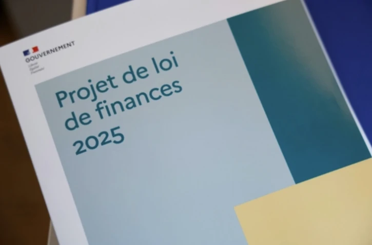 Le projet de loi de finances 2025 avant sa présentation, le 10 octobre 2024 à Paris ( AFP / Ludovic MARIN )