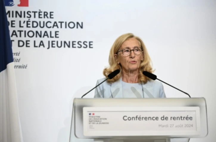La ministre démissionnaire de l'Education nationale Nicole Belloubet lors d'une conférence de presse, le 27 août 2024 à Paris ( AFP / Bertrand GUAY )