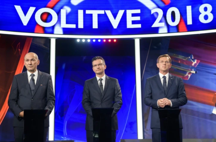 (g-d) L'ancien Premier ministre Janez Jansa et président du Parti démoratique slovène (SDS), Marjan Sarec, maire de Kamnik et président du LMS, Miro Cerar, Premier ministre sortant et président du Parti du centre moderne (SMC), avant un débat télévisé pour les élections législatives, le 28 mai 2018 à Ljubljana, en Slovénie