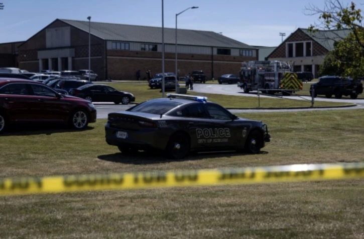 Une voiture de police devant le lycée Apalachee de Winder, en Géorgie (sud-est des Etats-Unis), le 4 septembre 2024 ( AFP / CHRISTIAN MONTERROSA )