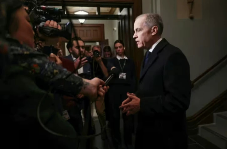 Mark Carney à Ottawa, le 11 février 2026 ( AFP / Dave Chan )