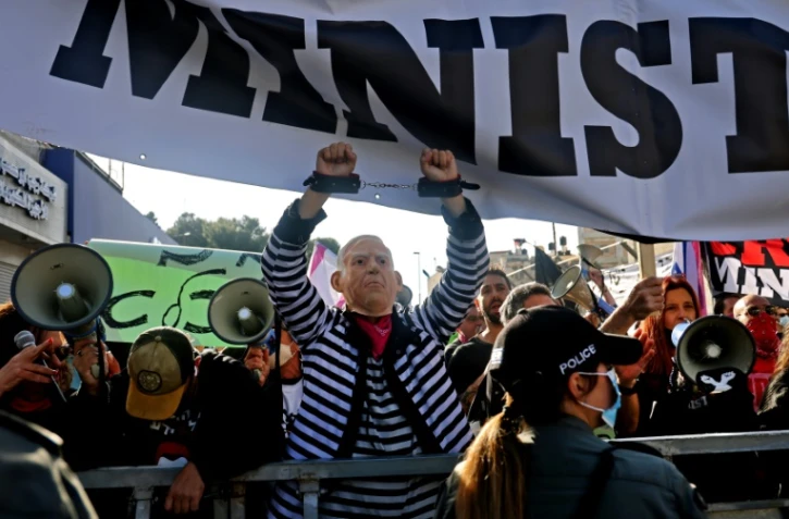 Manifestation devant le tribunal où le Premier ministre israélien Benjamin Netanyhahu doit répondre aux accusations de corruption, le 8 février 2021 à Jérusalem