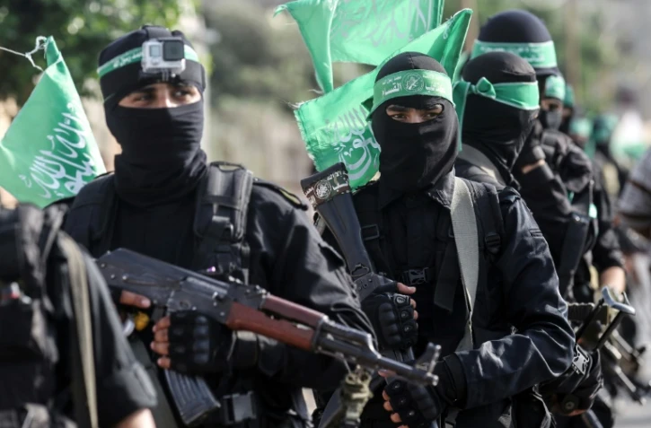 Combattants des brigades Ezzedine al-Qassam, la branche armée du Hamas, lors d'une parade le 20 juillet 2017 à Khan Younès, dans la bande de Gaza