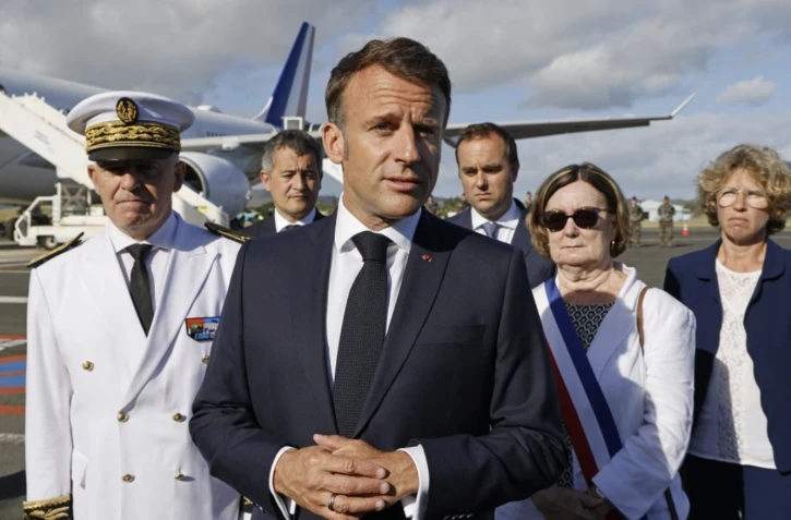 Le président a observé que "beaucoup de populations souffrent aujourd'hui d'une situation de grande crise", évoquant les difficultés d'accès aux soins, mais aussi "l'approvisionnement", dix jours après une éruption de violences inédites • PHOTO AFP 