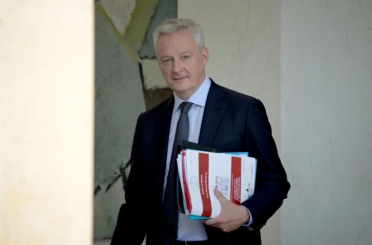 Bruno Le Maire, à la sortie de l'Elysée, le 26 juin 2024 à Paris ( AFP / Bertrand GUAY )