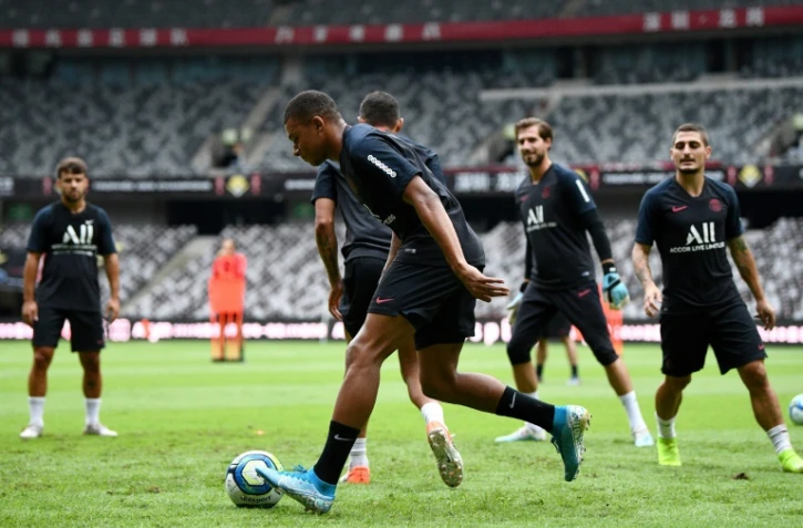 L'attaquant du Paris-SG, Kylian Mbappé (c), à l'entraînement avec ses partenaires à Shenzhen, en Chine, le 2 août 2019