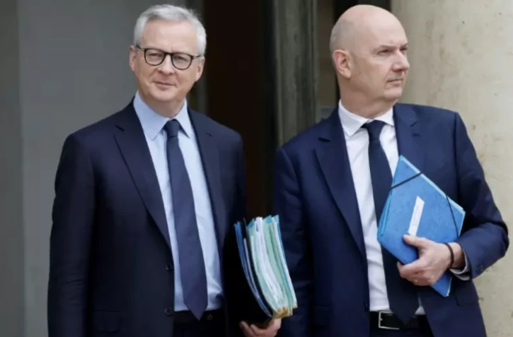 Les ministres de l'Economie, Bruno Le Maire (G), et de l'Industrie, Roland Lescure (D), à l'Elysée à Paris, le 22 mars 2023 ( AFP / Ludovic MARIN )