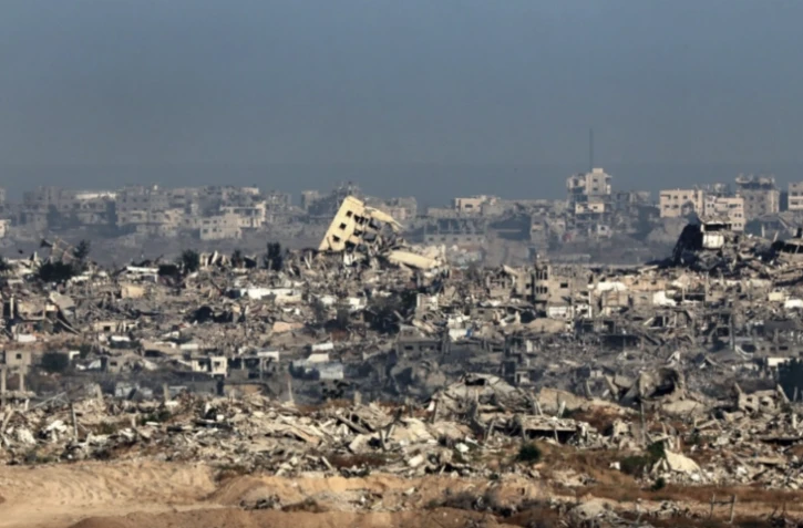 Les destructsions dans la bande de Gaza vues du sud d'Israël, le 20 mai 2025 ( AFP / Jack GUEZ )