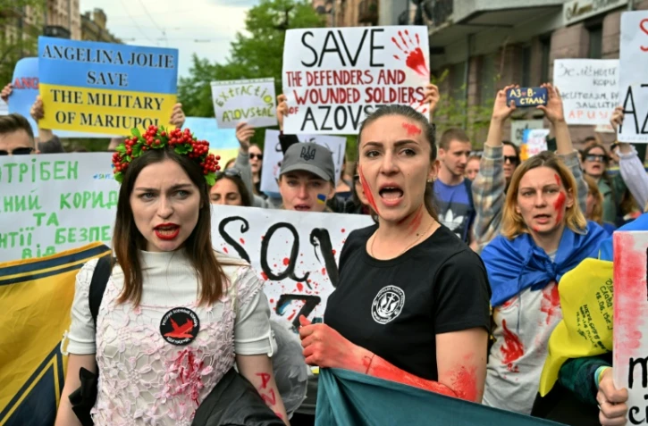 About 200 civilians are estimated to still be trapped in the labyrinth of Soviet-era bunkers and tunnels snaking beneath the sprawling steelworks, alongside a smattering of Ukrainian units making their last stand