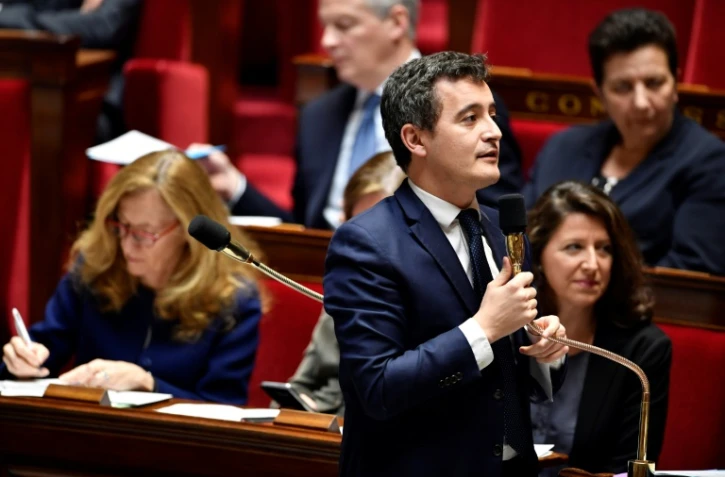 Le ministre de l'Action et des Comptes publics Gérald Darmanin parle à l'Assemblée lors d'une séance de questions au gouvernement le 13 février 2018 à Paris