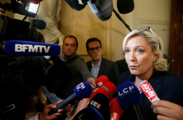 Marine Le Pen, président du Front National, s'adresse aux médias, le 29 juin 2017 à l'Assemblée nationale à Paris