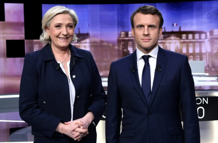 Marine Le Pen et Emmanuel Macron, candidats à la présidence française, le 3 mai 2017 à Paris
