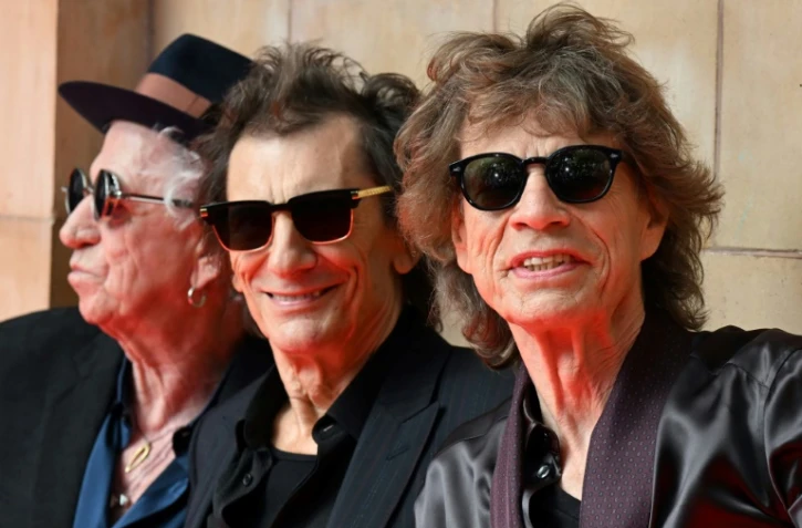 (g-d) Les Rolling Stones Keith Richards, Ron Wood et Mick Jagger pour le lancement de leur nouvel album "Hackney Diamonds", le 6 septembre 2023 au Hackney Empire Ă Londres