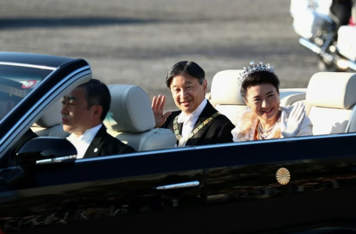 L'empereur Naruhito et l'impératrice Masako durant leur parade publique le 10 novembre 2019 à Tokyo