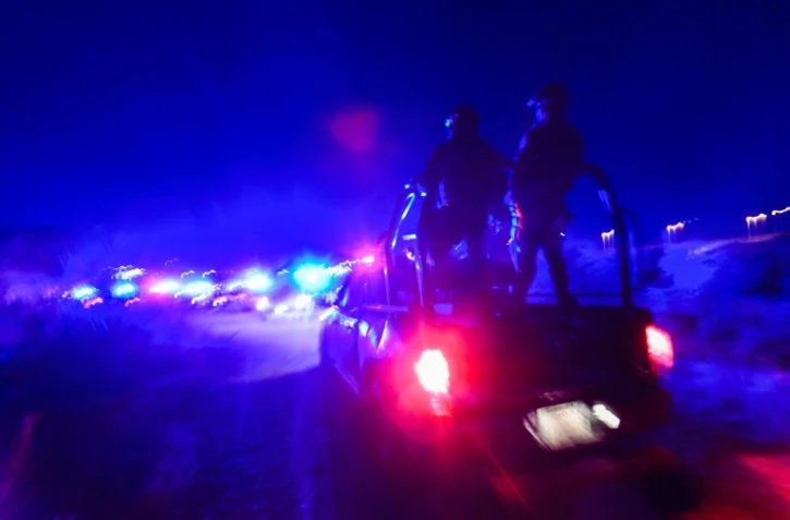 La police mexicaine patrouille près du Rio Grande pour empêcher le passage de ce fleuve frontière entre la ville mexicaine de Ciudad Acuna et les Etats-Unis, le 23 septembre 2021