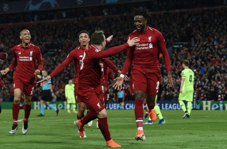 L'attaquant belge Divock Origi (N.27) qualifie Liverpool en marquant le 4e but contre Barcelone Ă Anfield, le 7 mai 2019