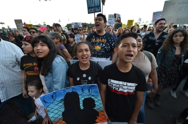 Des manifestants contre la séparation des enfants de leurs parents sans-papiers le 14 juin 2018 à Los Angeles